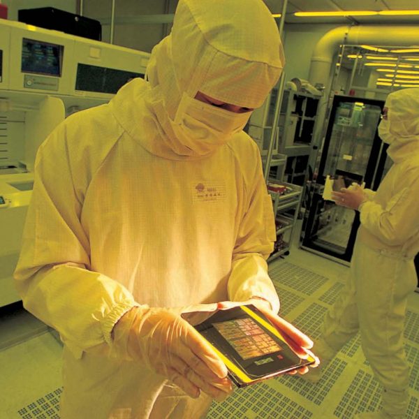 TSMC Scientist Holding Chip
